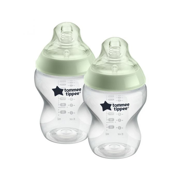 2 Closer to Nature baby bottles with green screwrings on a white background