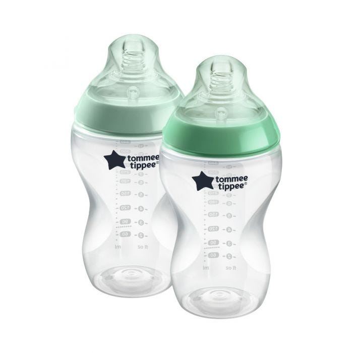 2 Closer to Nature baby bottles with green screwrings on a white background