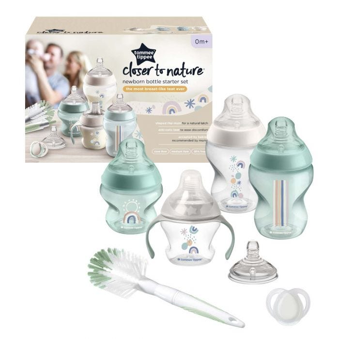 Newborn bottle feeding set with 4 Closer to Nature bottles, teat, soother and brush next to packaging on a white background.