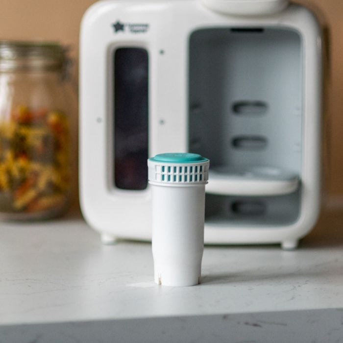 Replacement filter on a kitchen counter in front of the Perfect Prep D&N machine