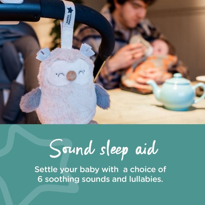 Owl Mini Sleep Aid attached to pram in café next to parent holding baby with text stating that it is a sound sleep aid.