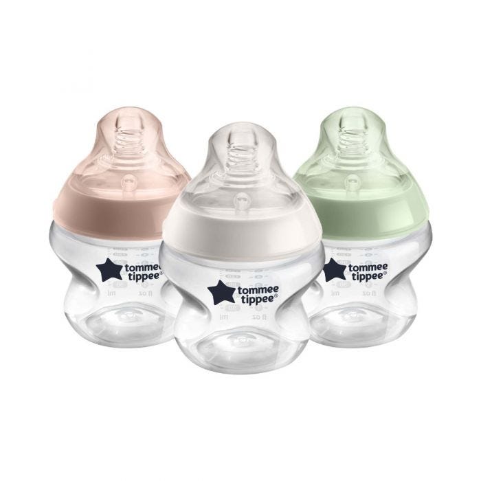 3x 150ml Closer to Nature baby bottles with green, cream and pink screwrings on a white background.