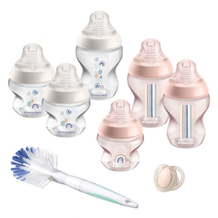 Clear and pink Closer to Nature Baby Bottle Starter Set with 6x bottles, brush, 1x soother on a white background.
