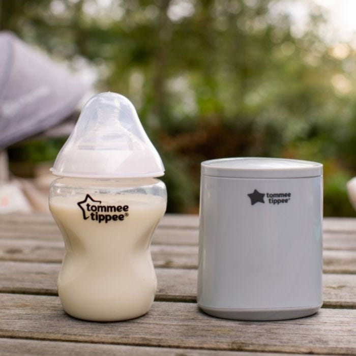 LetsGo Portable Baby Bottle Warmer shown on a table outside