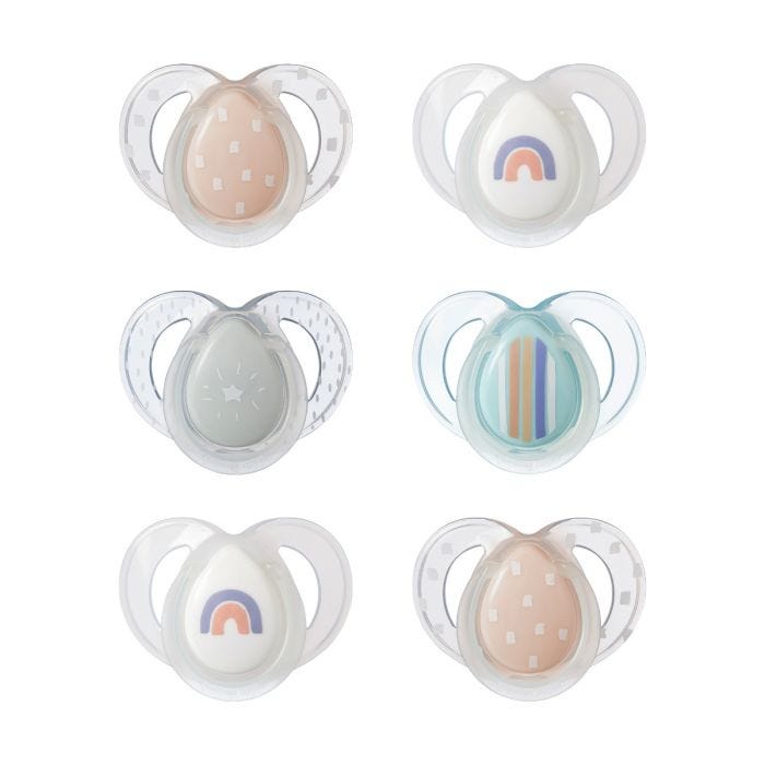 6 pack of Night Time soothers in various colours and designs on a white background.