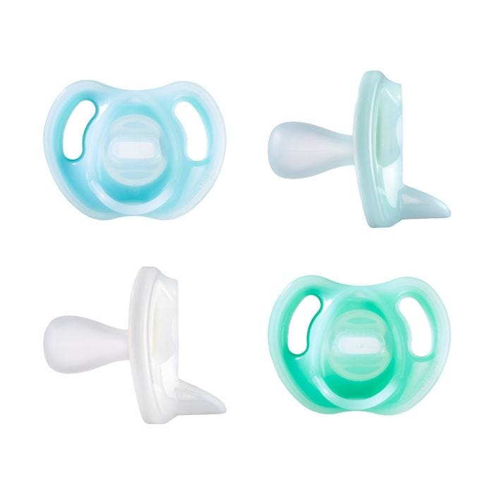 4 sucettes sous différents angles sur fond blanc