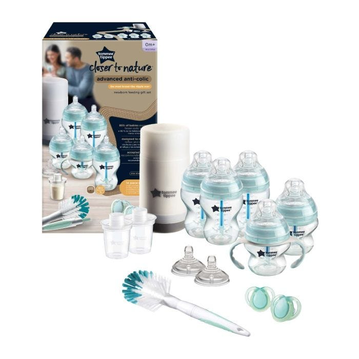Advanced Anti-Colic newborn gift set next to packaging on white background.