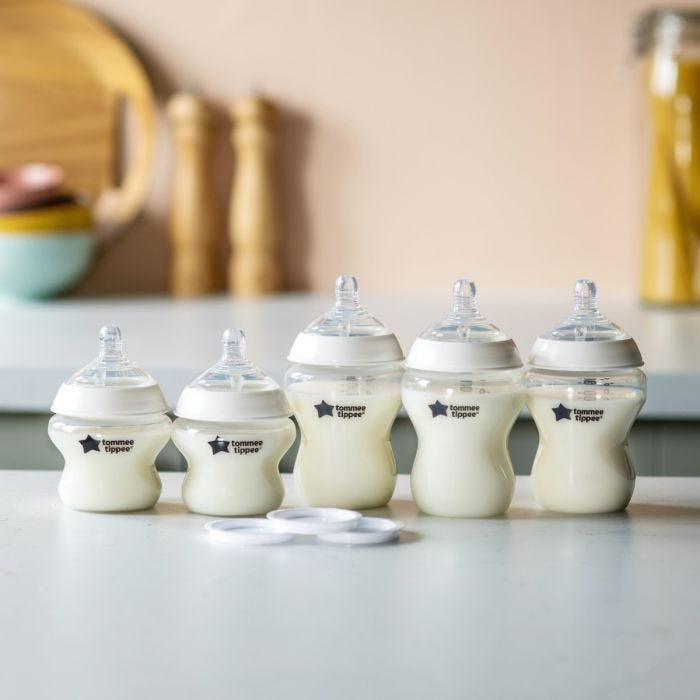 First bottle solution baby bottle set on a kitchen counter.