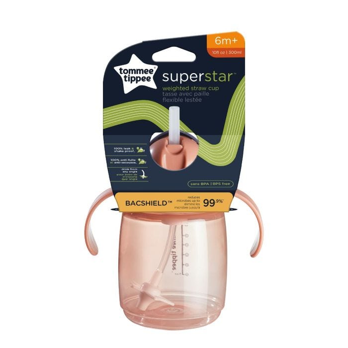 Pink weighted straw cup in its packaging against a white background