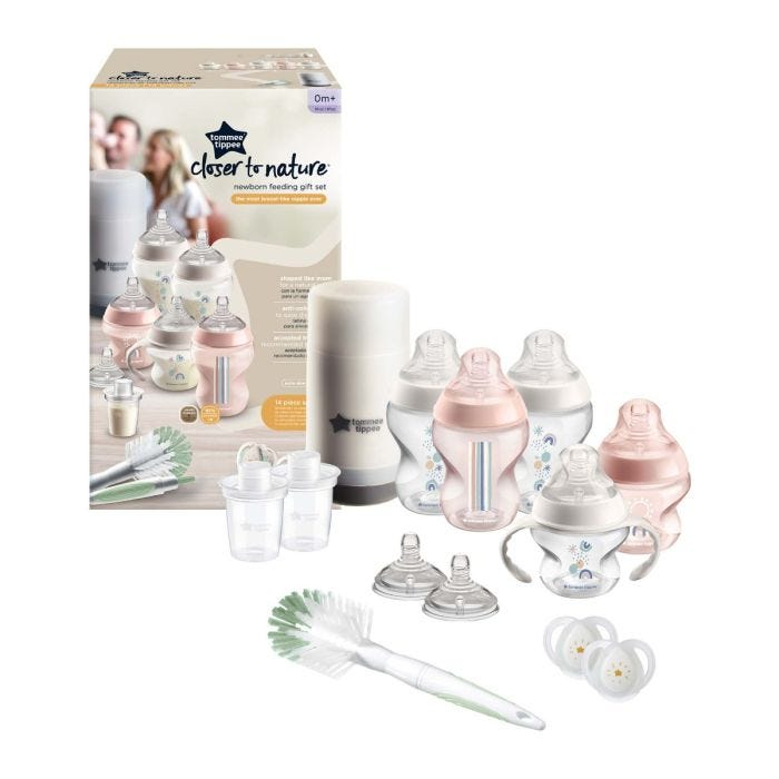 Closer to Nature Baby Bottle Newborn Feeding Gift Set next to packaging on white background.