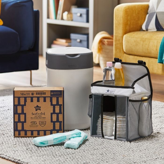 Products included in the ultimate nappy disposal bundle. Including bin, 18 pack of eco refills and change caddy in home setting.