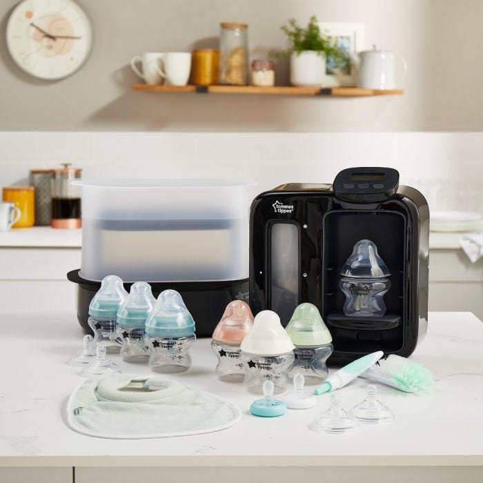 Products included in the complete bottle feeding bundle. Including steriliser, perfect prep machine and bottles in kitchen.