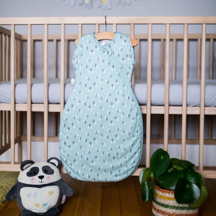 The Original Grobag Treasure Trees Snuggle hanging on side of cot