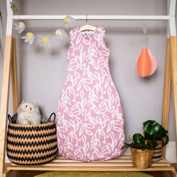 The Original Grobag Botanical Sleepbag hanging on rail in nursery