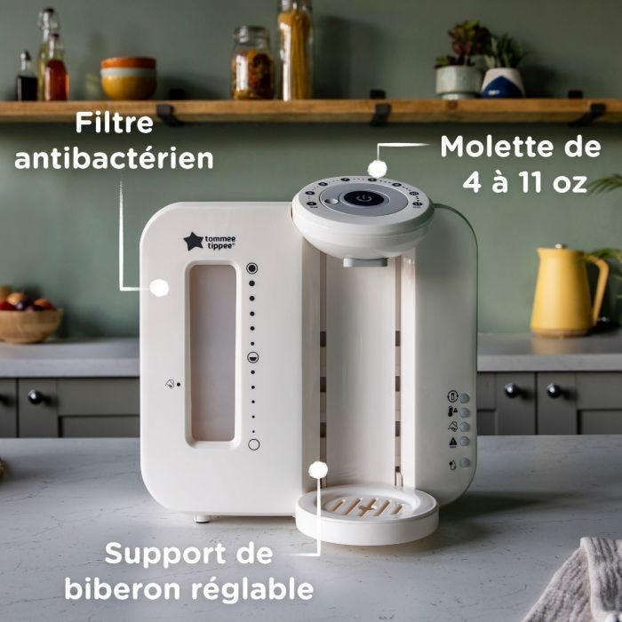 Machine Perfect Prep blanche sur un comptoir de cuisine avec des flèches vers son filtre, son support et sa molette réglables
