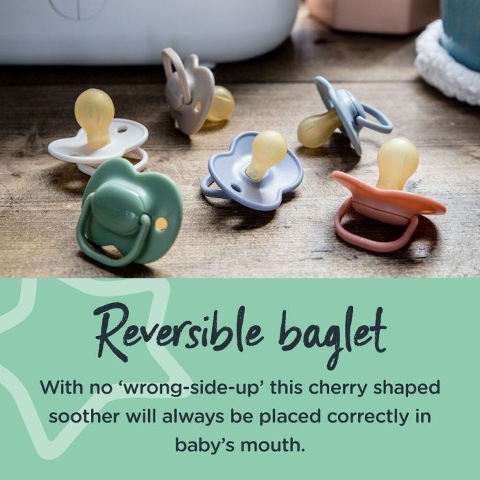 Multiple Cherry latex soothers on a kitchen counter with text about their reversible baglets