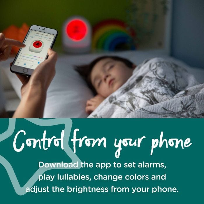 Toddler sleeping while mum looks at app on her phone with text about how you can control the clock from your phone