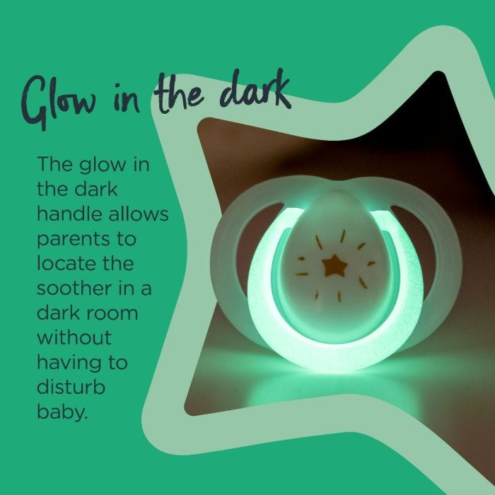 Night-Time soother glowing in the dark with text explaining the soother has a glow in the dark handle.