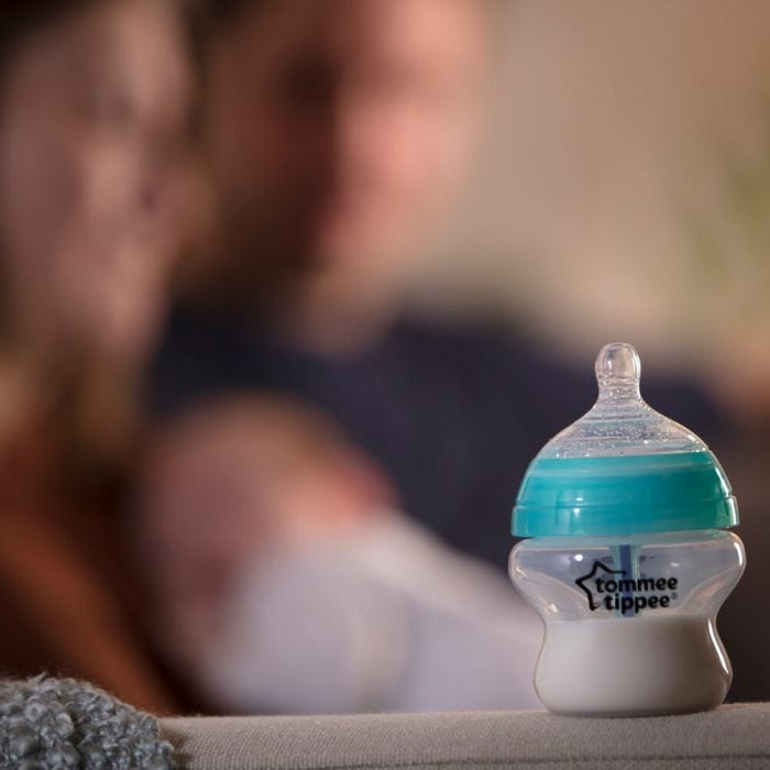 Tommee Tippee bottle on blurred background 