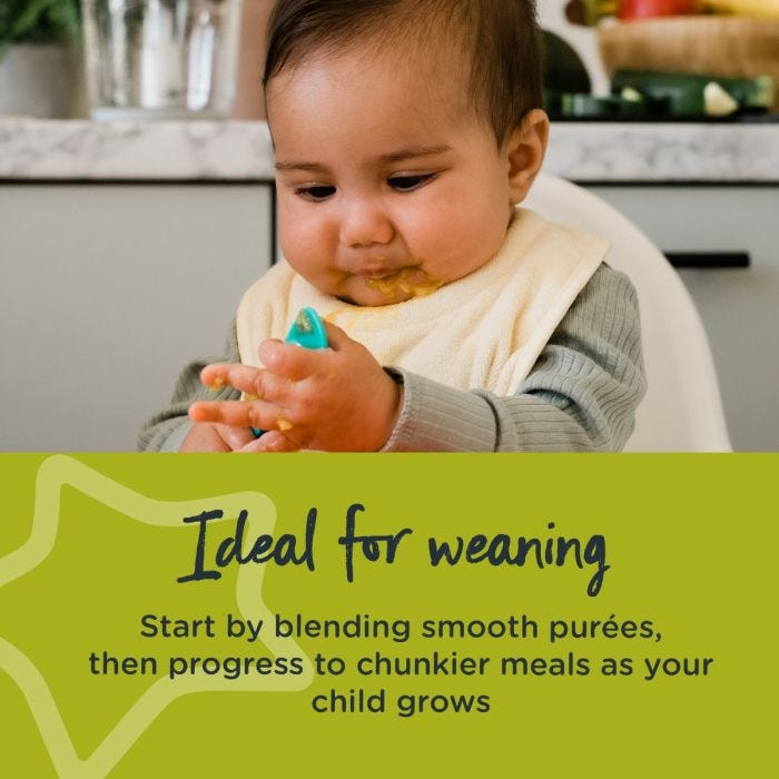 Baby sitting in highchair wearing a bib with text about how the blender is ideal for weaning