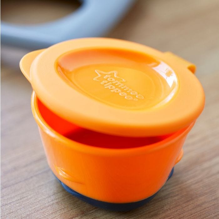 Orange pop-up pot on a kitchen counter