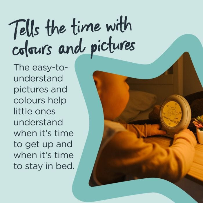 Child looking at Groclock next to text explaining this clock telles the time with colours and pictures.