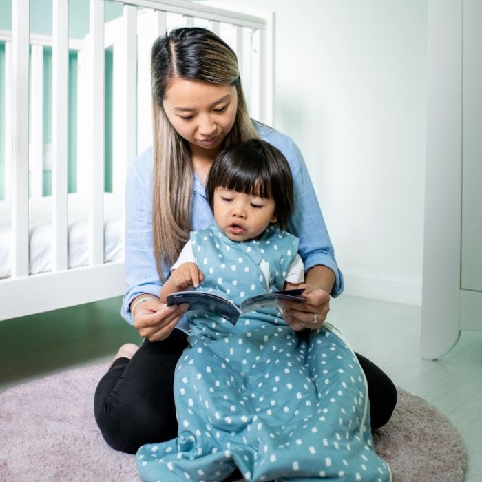 mum with child wearing The Original Grobag Navy Speckle Sleepbag