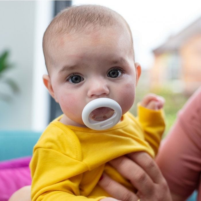 Baby with soother 