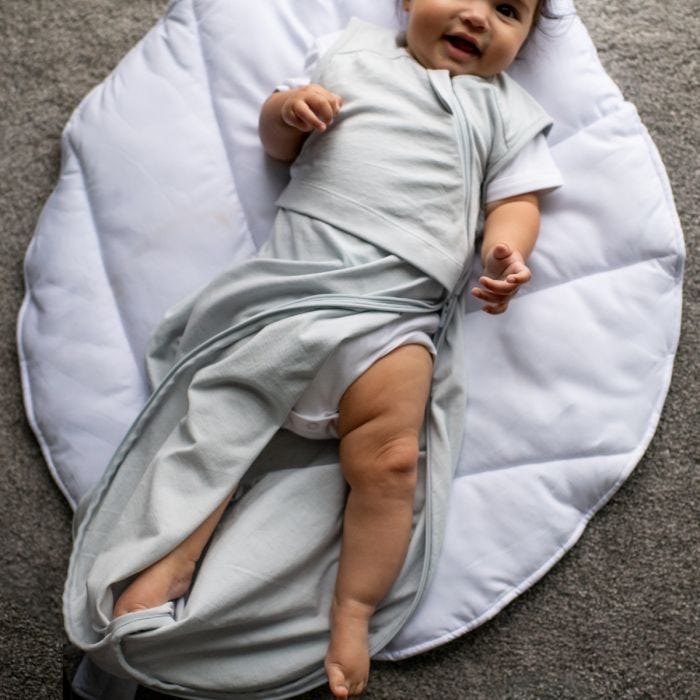 Child in All-Season Grobag Lay Down