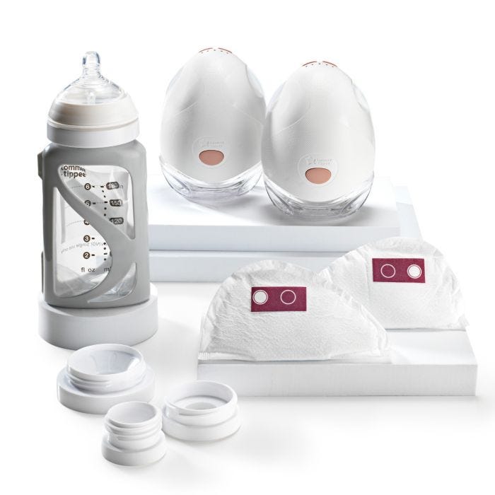 Product imagery of contents of wearable breast pump bundle on a white background