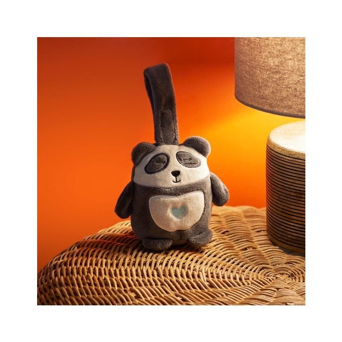 pip the panda sleep aid next to light