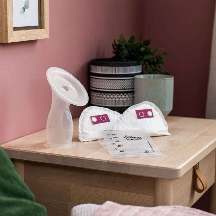 Products included in the breastfeeding start pack bundle. Including silicone breast pump, breast pads and more in kitchen.