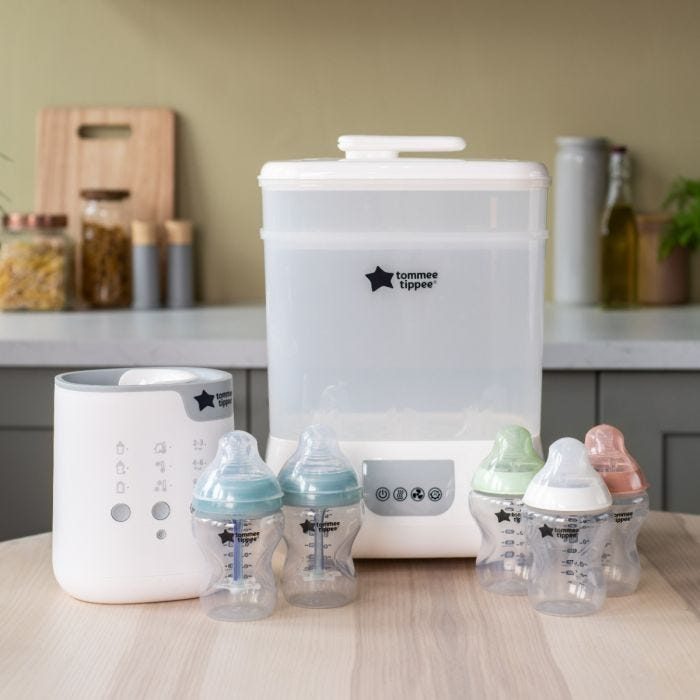 Product image showing the contents of the complete bottle feeding bundle in home setting