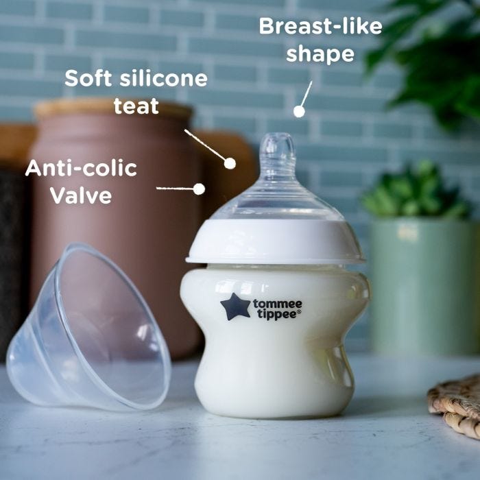  Closer to Nature baby bottle on a beige background with roundels stating mixed sizes, set and BPA free.