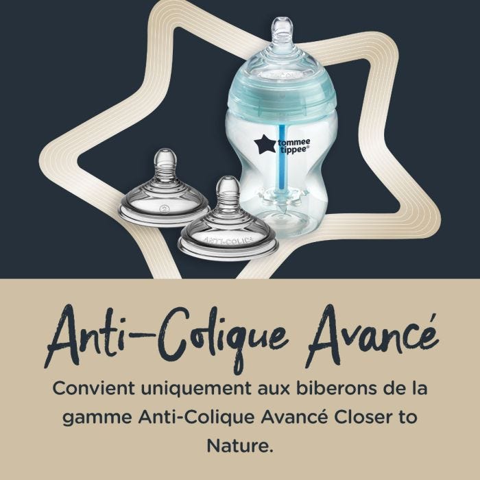 Biberon et tétines sur fond bleu marine, entourés d&apos;une étoile blanche