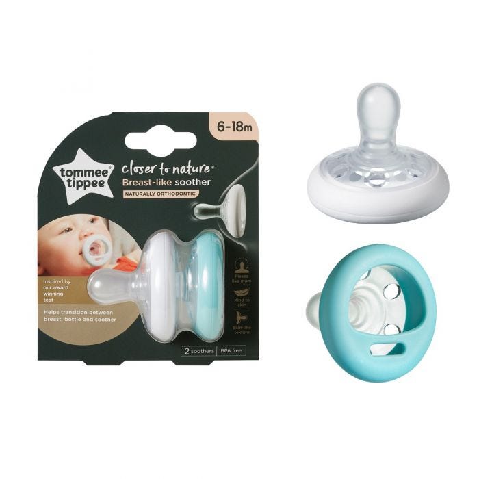 Two breast like soothers next to packaging on a white background