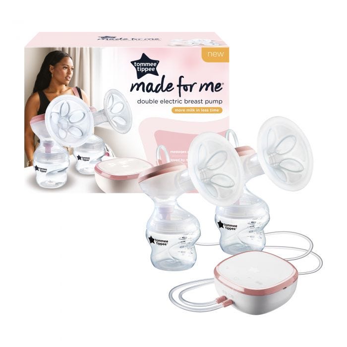 Double electric breast pump with power unit in front of packaging on white background