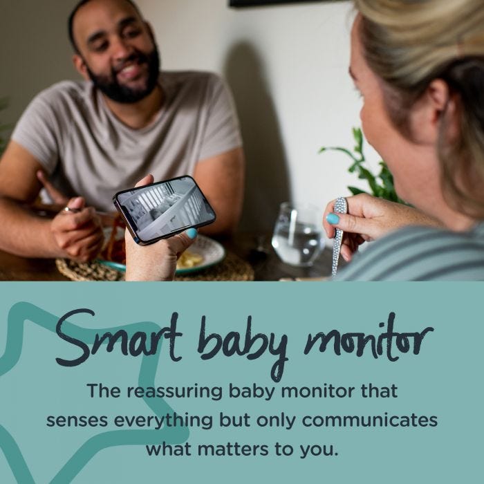 Mum and dad eating dinner whilst looking at live images of baby on a mobile. Text describing the benefits of the smart monitor.