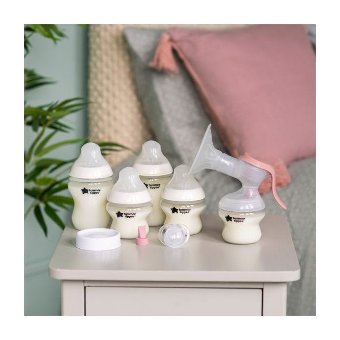 All Closer to Nature Breastfeeding Kit components placed on bedside table