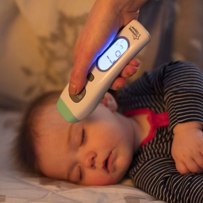 no-touch-forehead-thermometer-used-to-take-temperature-as-baby-sleeps