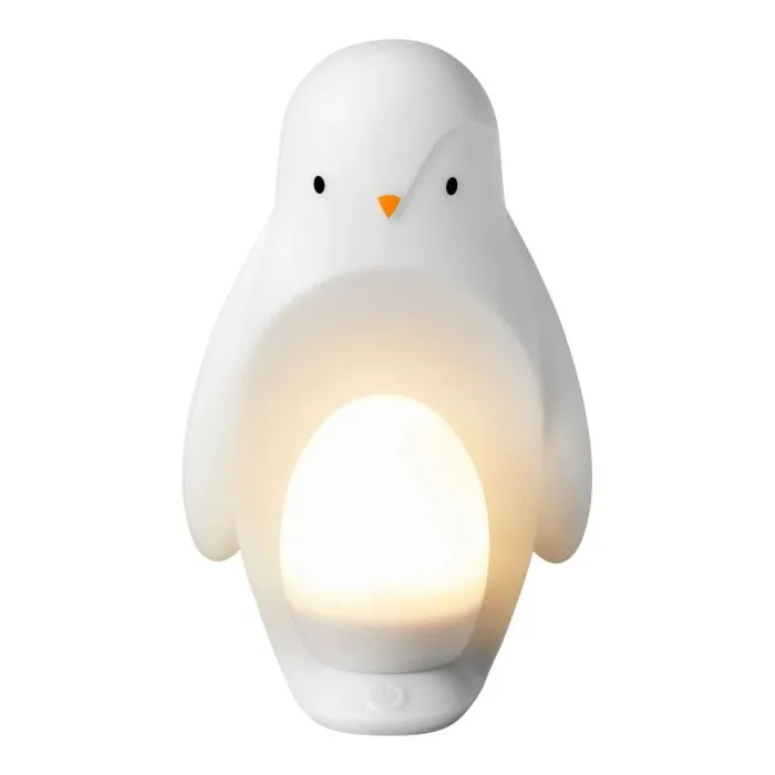 Penguin night light on a white background