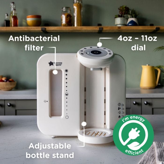 White Perfect Prep machine on kitchen counter with pointers to its filter, adjustable stand and dial