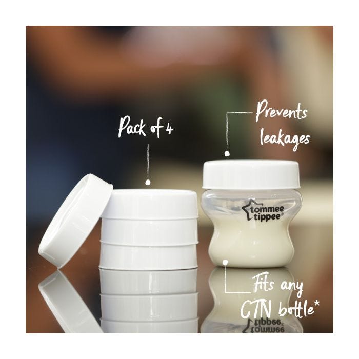 Milk storage lids and a Closer to Nature baby bottle on a table with pointers labelling the key features