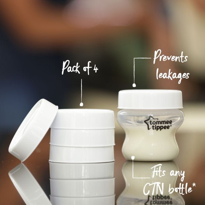 Milk storage lids and a Closer to Nature baby bottle on a table with pointers labelling the key features