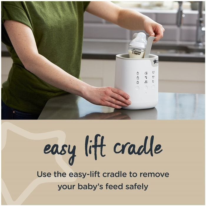 Person using the the easy lift cradle on a 3-in-1 Advanced Bottle and Pouch Warmer