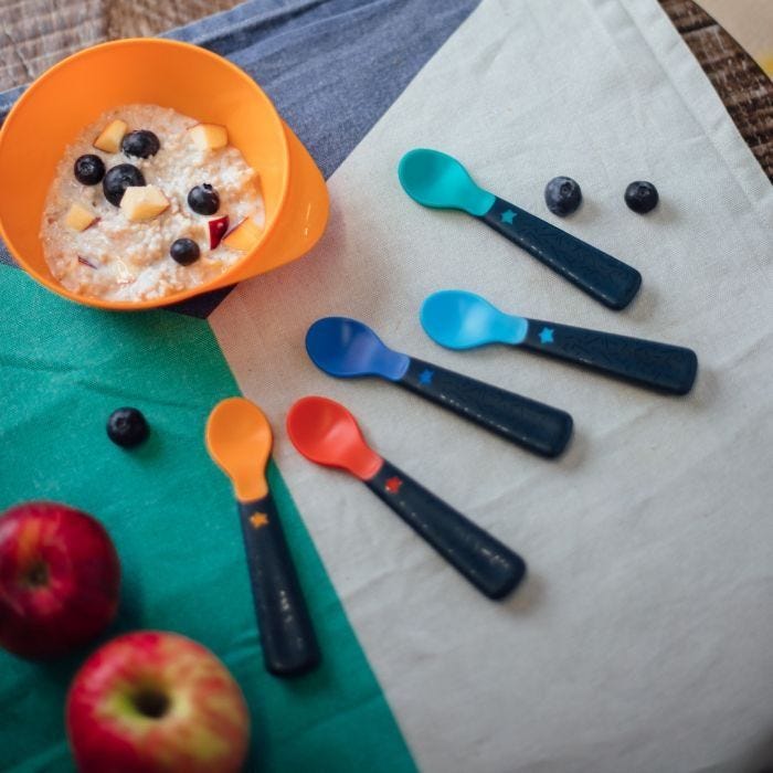 overhead shot of Easigrip™ self feeding spoons on table