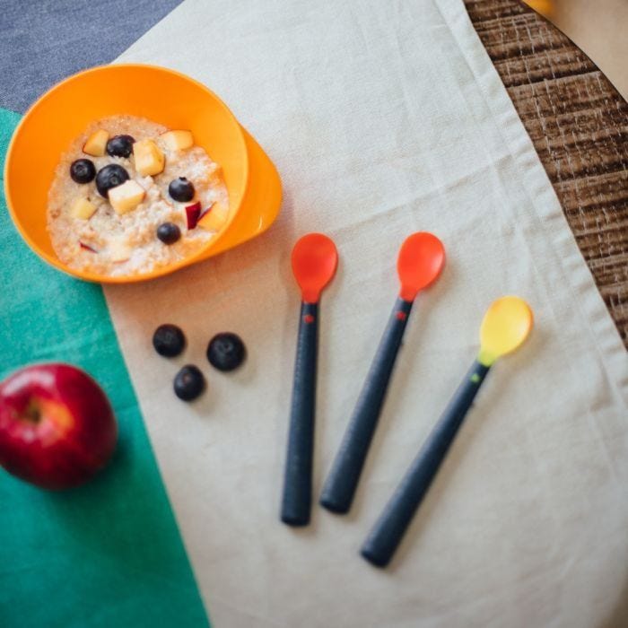 overhead shot Heat sense soft weaning spoons 
