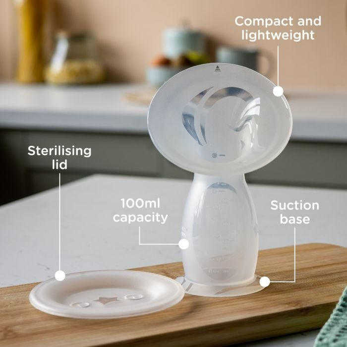 Silicone breast pump and sterilising lid on kitchen counter with pointers of its best features