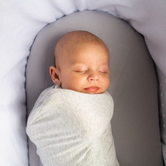 Baby in swaddle wrap
