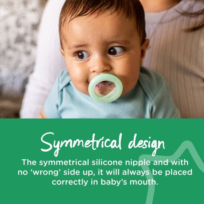 Baby with green breast-like night pacifier in mouth with describing the benefits of the symmetrical orthodontic design.
